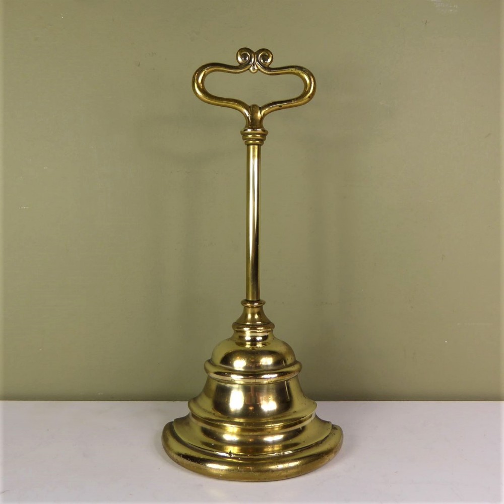 A BRASS DOOR PORTER