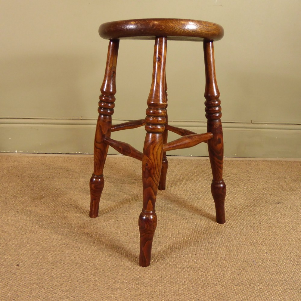 A 19TH C OAK & ELM STOOL