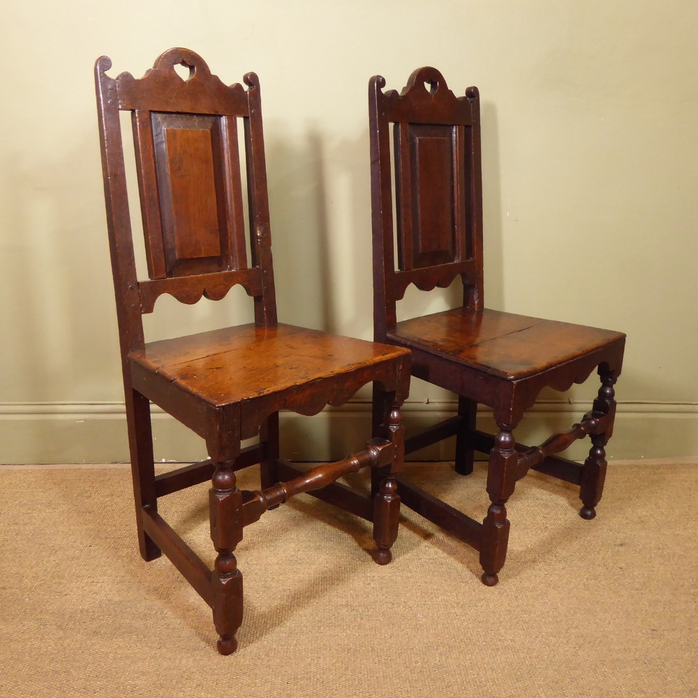 PAIR OF GEORGE I OAK CHAIRS, BACK STOOLS