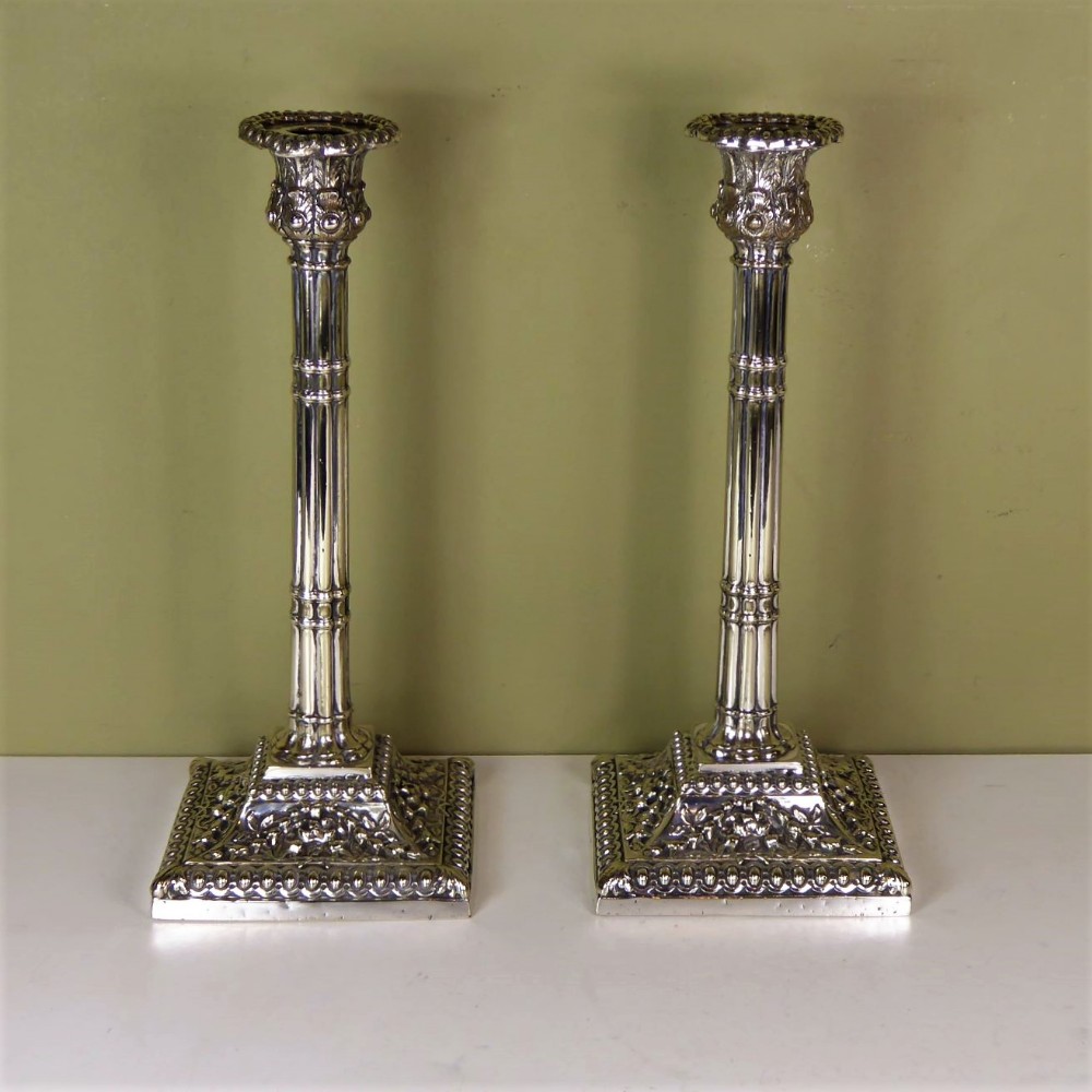 A PAIR OF GEORGE III CANDLE STICKS