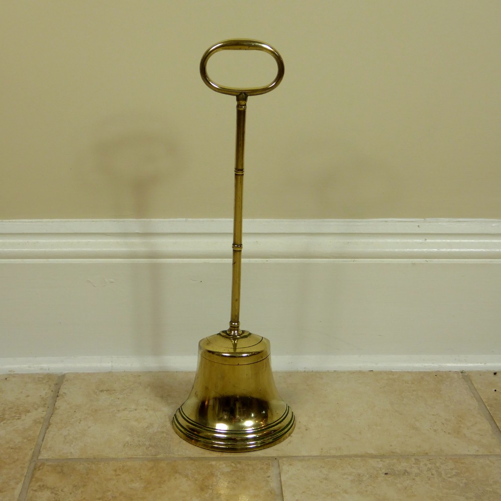 EARLY 19TH C BRASS DOOR PORTER