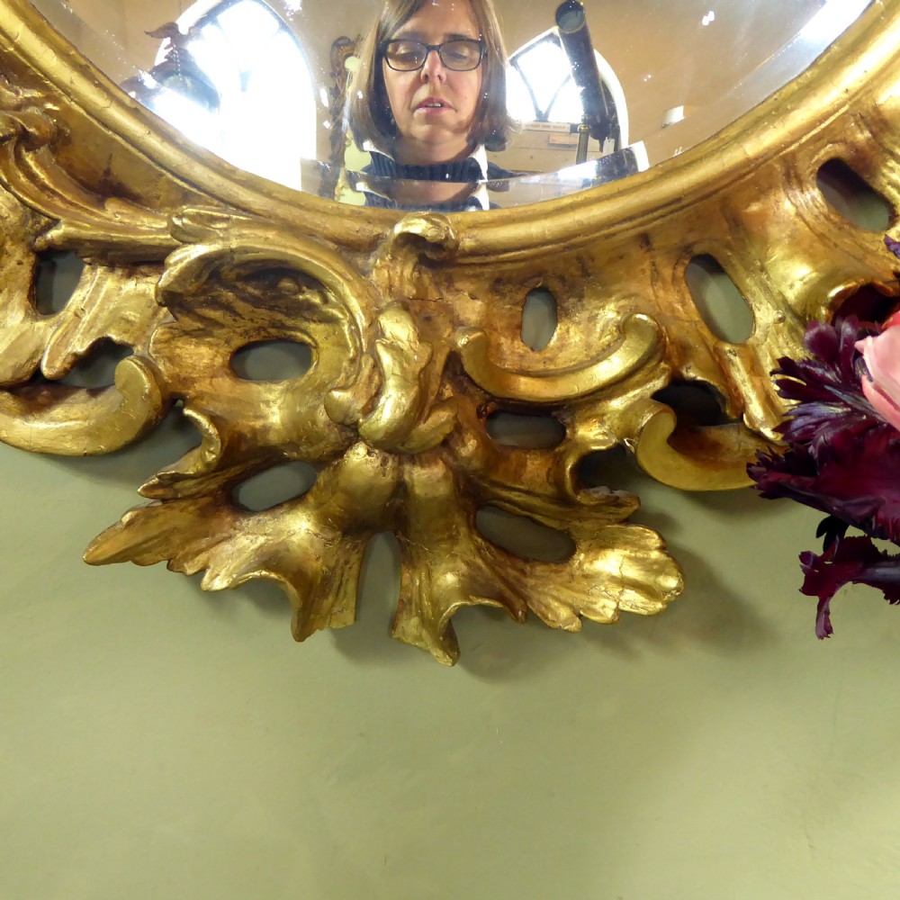 A LARGE GEORGE III GILT MIRROR View II