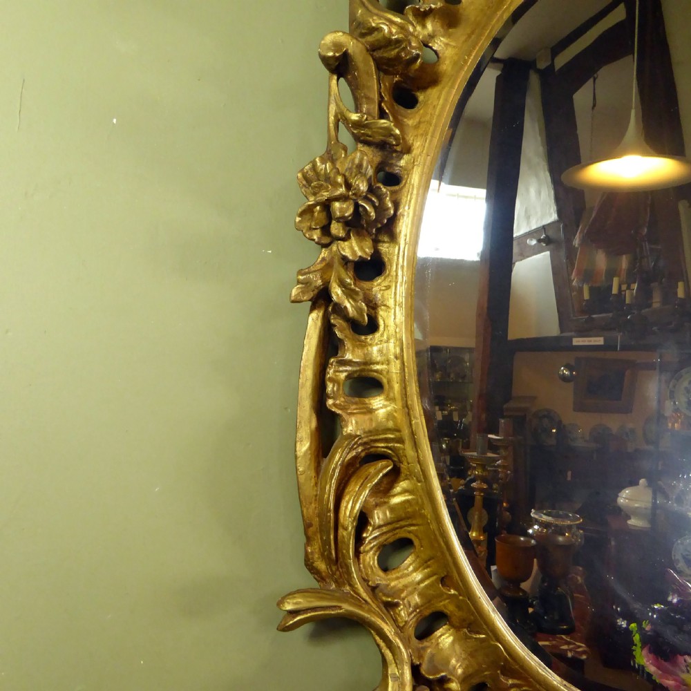 A LARGE GEORGE III GILT MIRROR View IV
