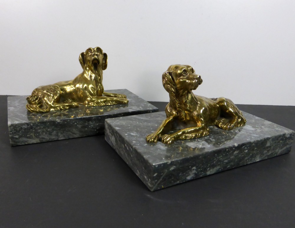 PAIR OF 19TH C BRASS DOGS ON MARBLE PLINTHS