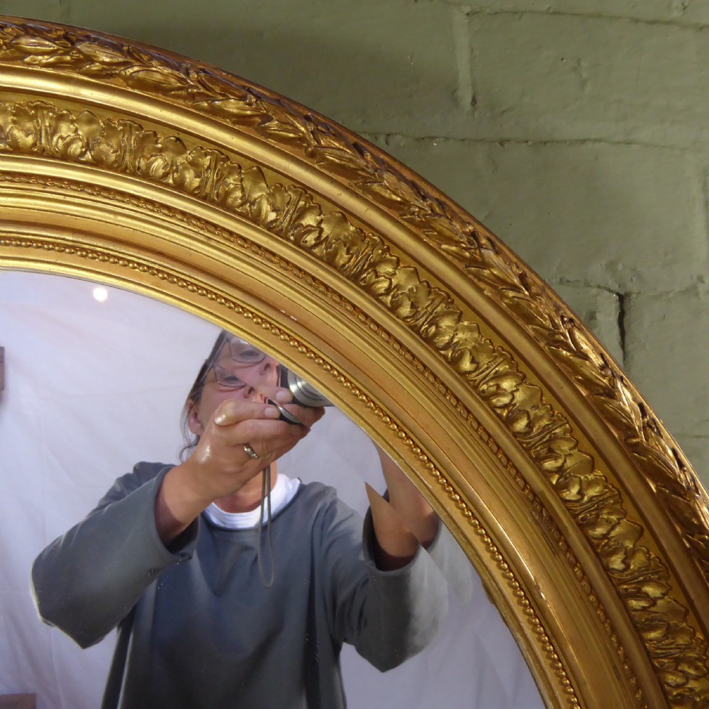 LARGE 19TH C OVAL GILT MIRROR View III