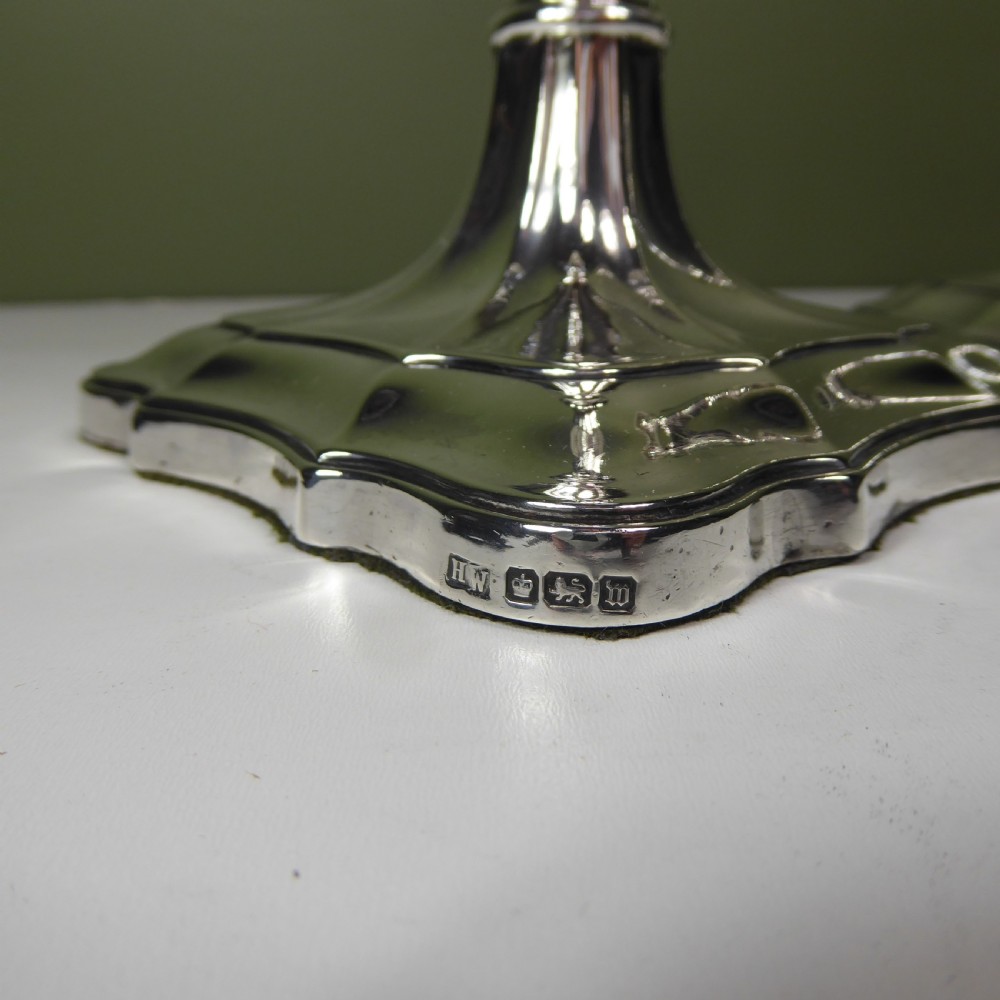 A PAIR OF SILVER CANDLESTICKS View III