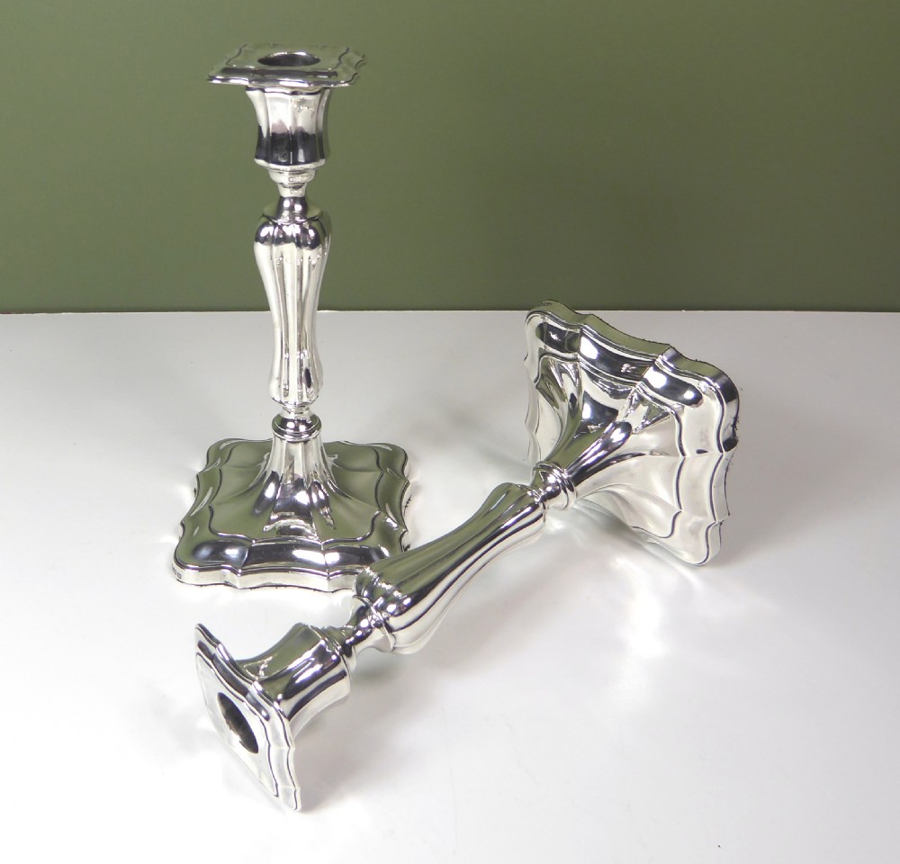 A PAIR OF SILVER CANDLESTICKS View IV