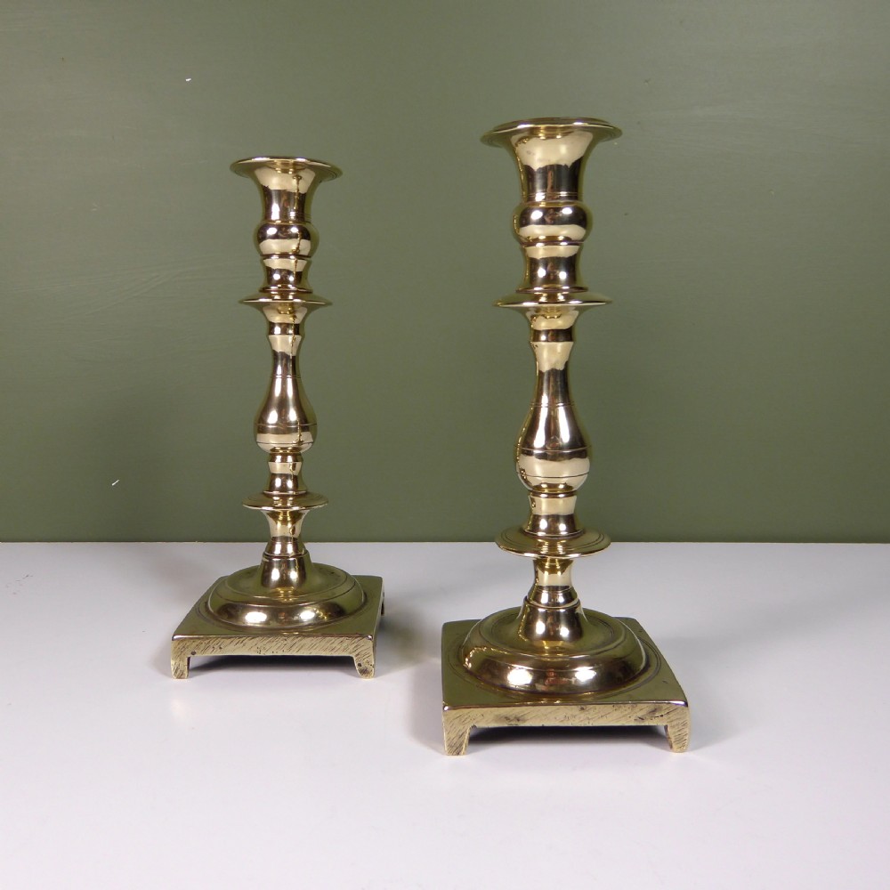 PAIR OF CAST BRASS CANDLESTICKS 1820