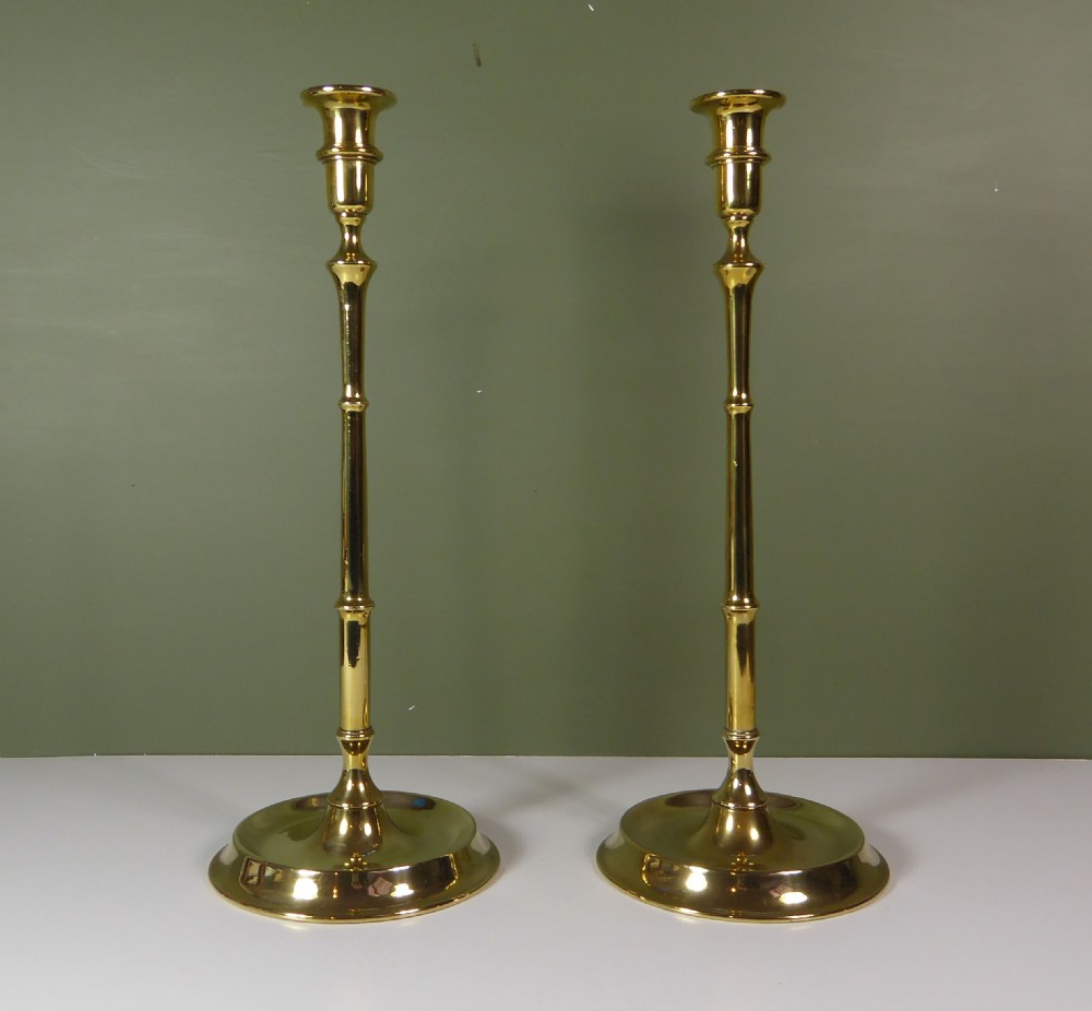 TALL PAIR OF BRASS CANDLESTICKS