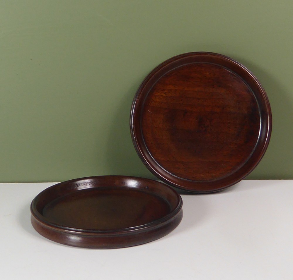 PAIR OF 18TH C MAHOGANY BOTTLE COASTERS