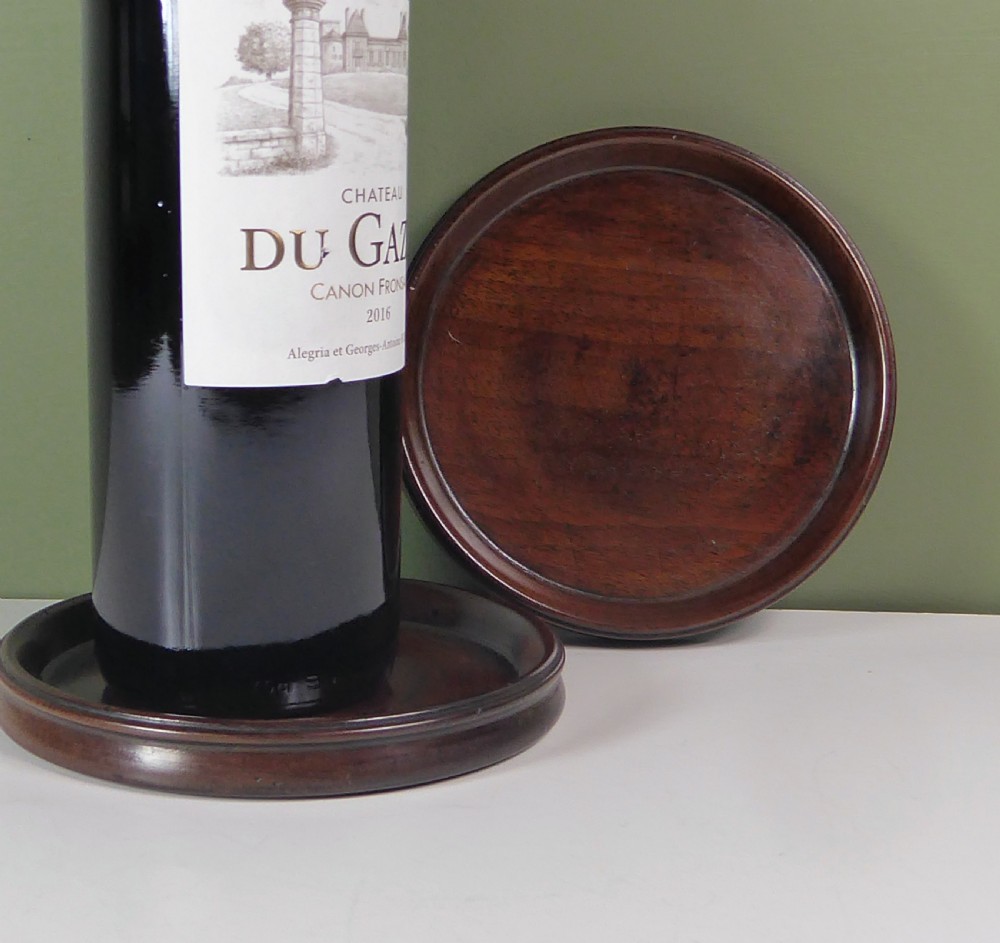 PAIR OF 18TH C MAHOGANY BOTTLE COASTERS View III