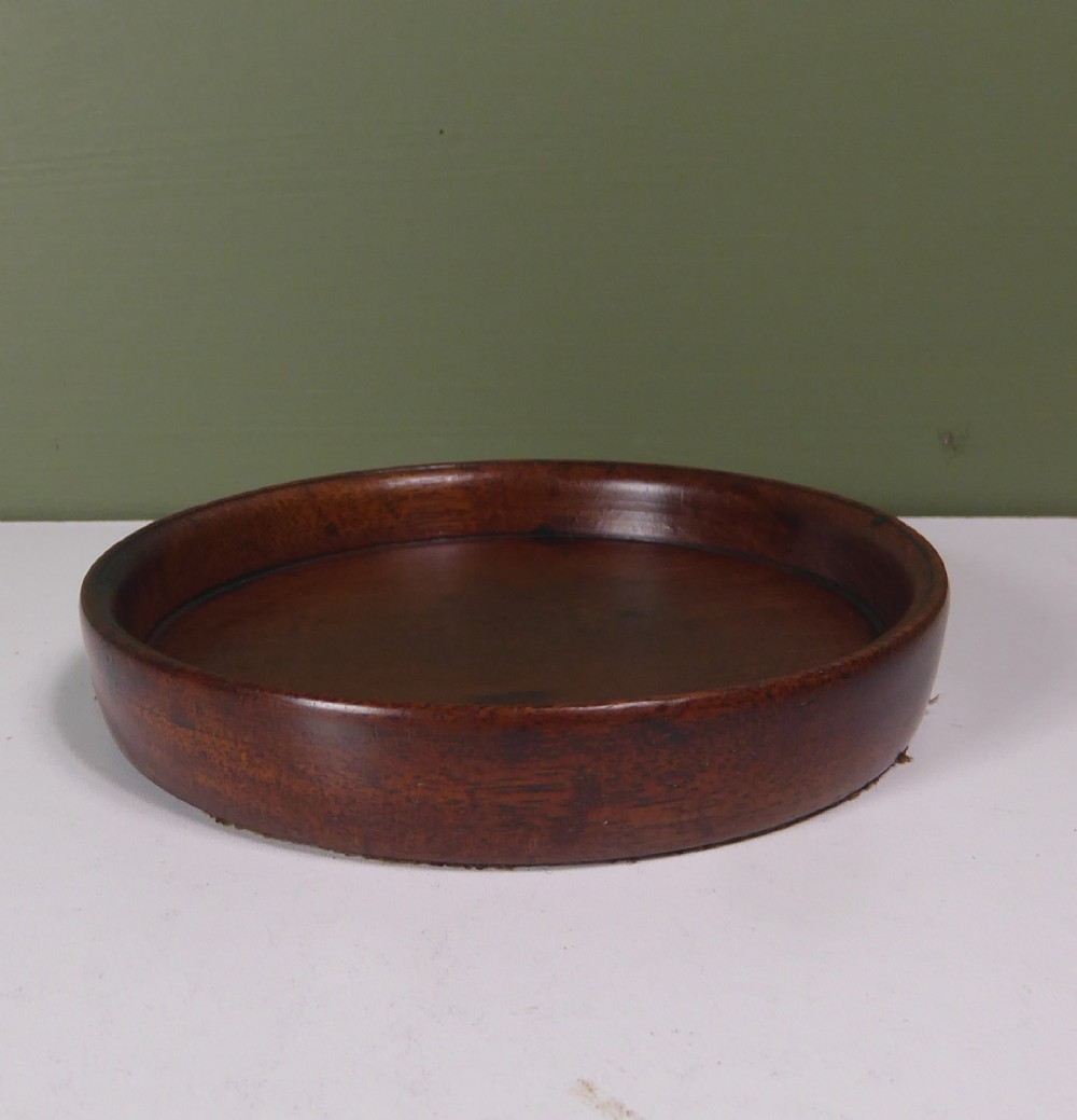 GEORGE III MAHOGANY BOTTLE COASTER
