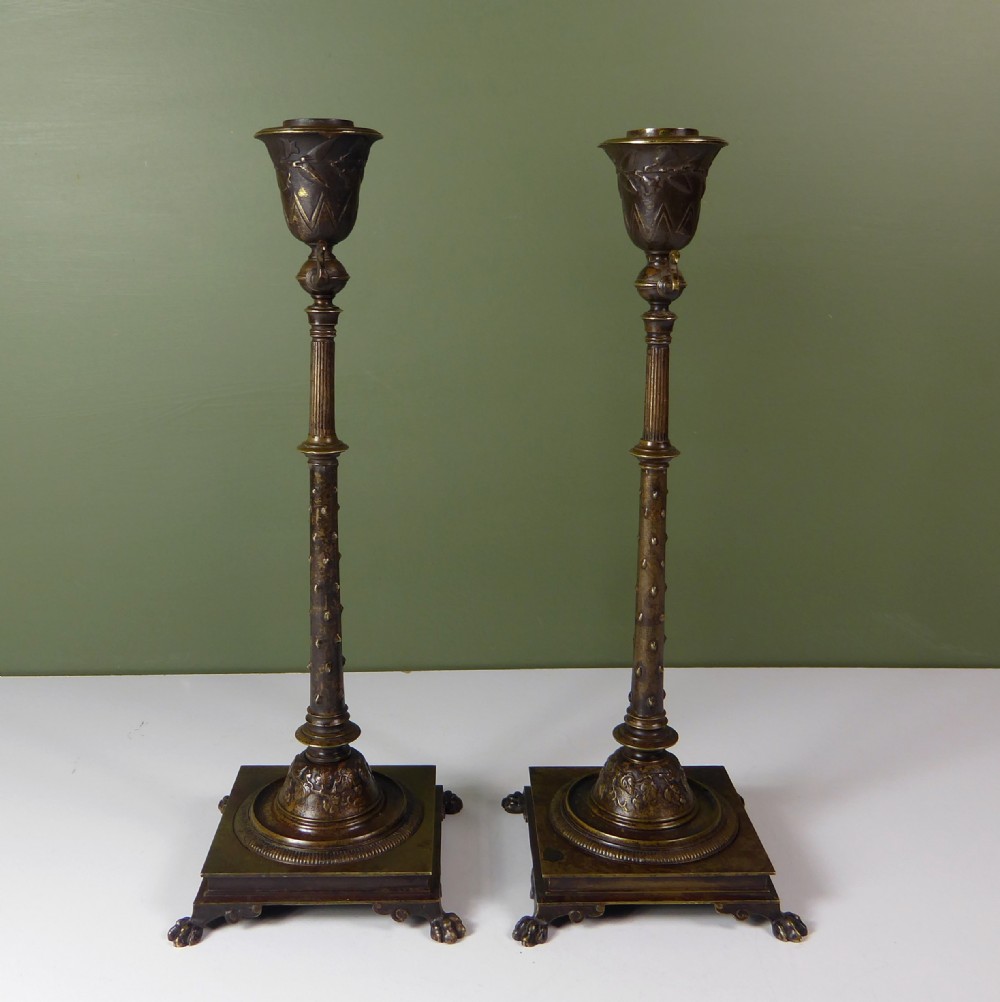 PAIR OF AESTHETIC MOVEMENT BRONZE CANDLESTICKS