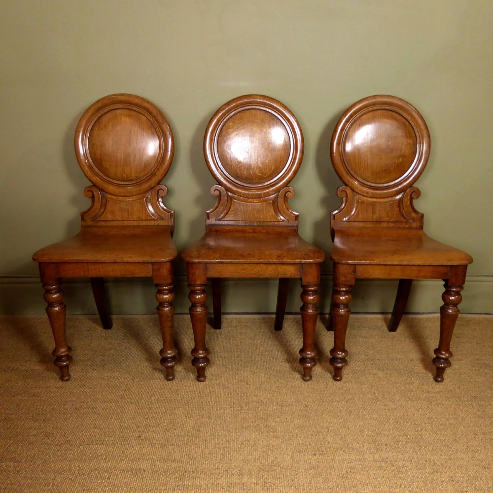 SET OF THREE 19TH C OAK HALL CHAIRS