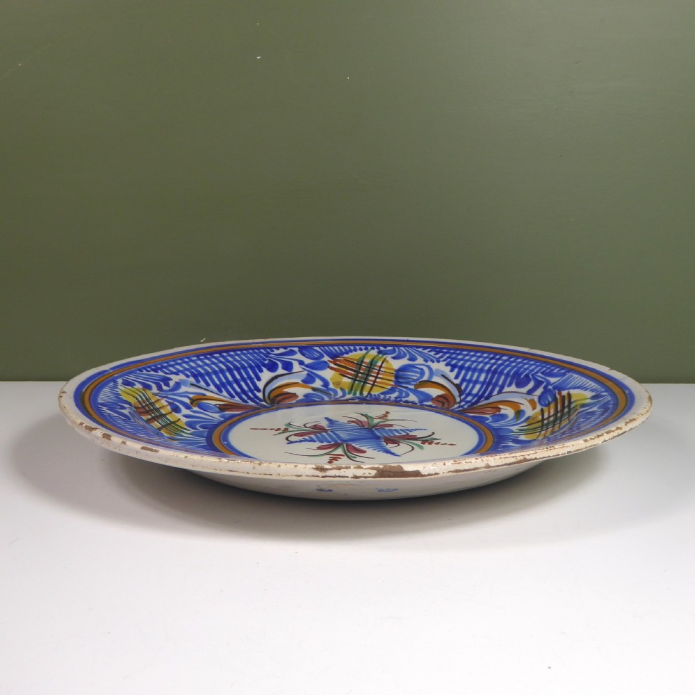 19TH C TIN GLAZED CHARGER View IV