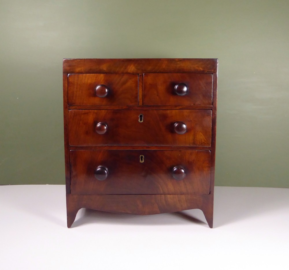 REGENCY MAHOGANY MINIATURE CHEST OF DRAWERS