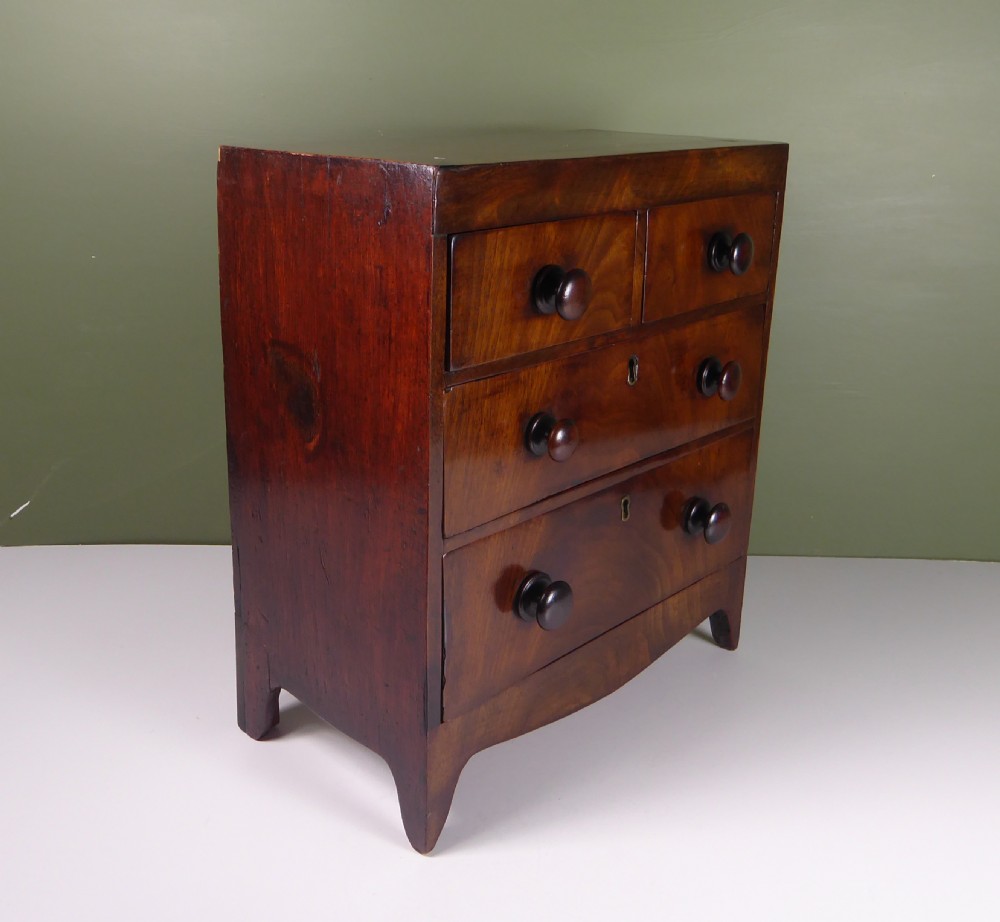 REGENCY MAHOGANY MINIATURE CHEST OF DRAWERS View II