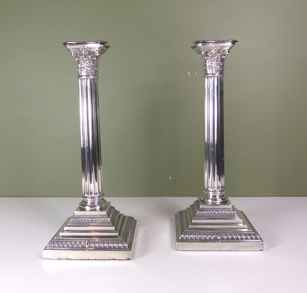 PAIR OF SILVER CANDLESTICKS