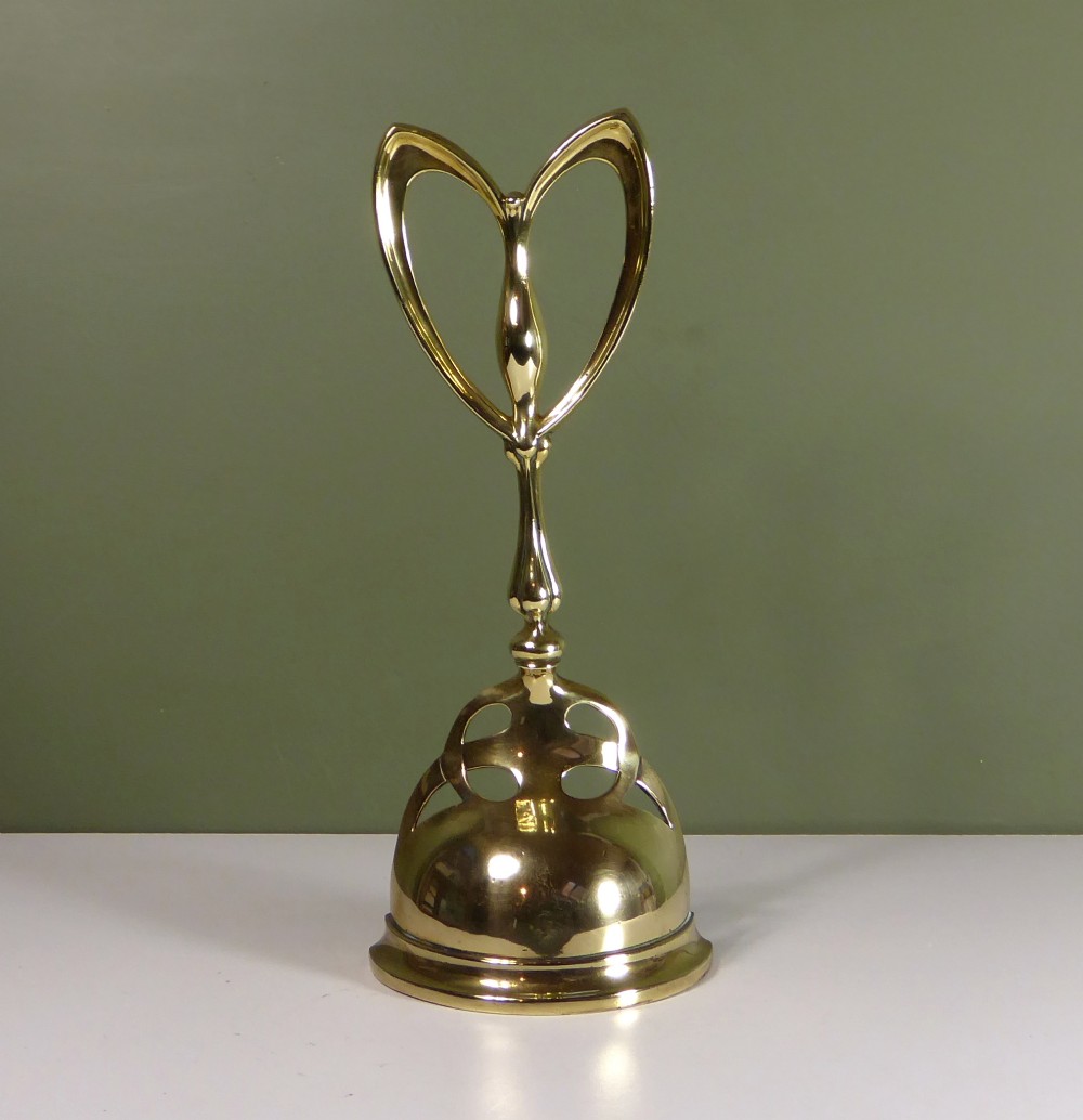 19TH C BRASS DOOR PORTER, DOOR STOP