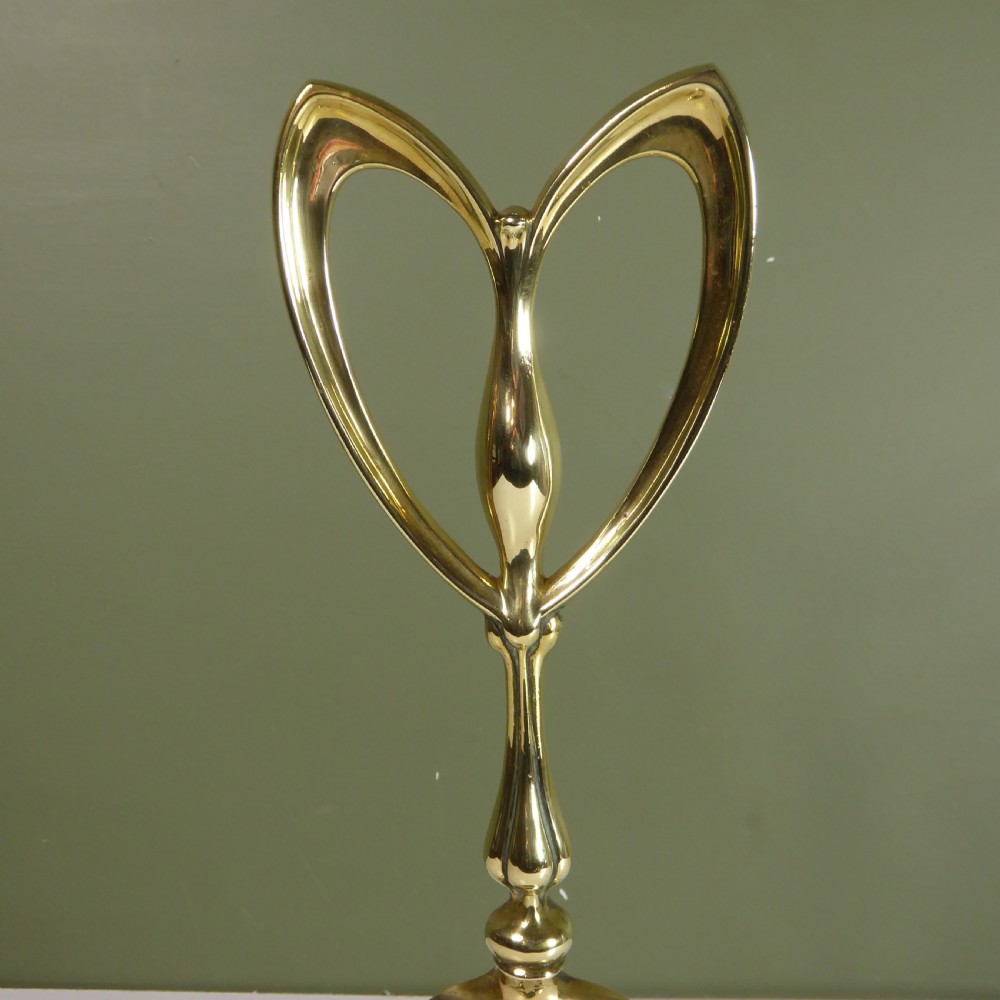 19TH C BRASS DOOR PORTER, DOOR STOP View III
