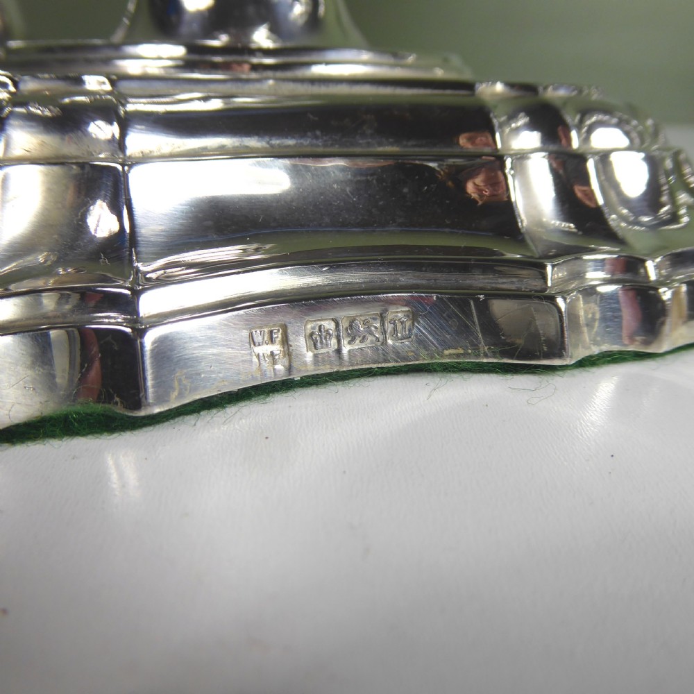 SET OF FOUR LARGE SILVER CANDLESTICKS View III
