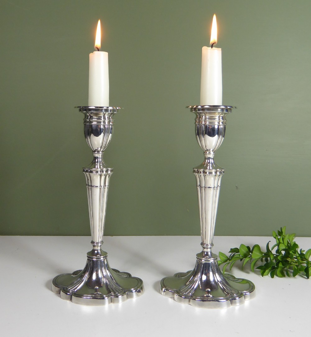PAIR OF SILVER CANDLESTICKS