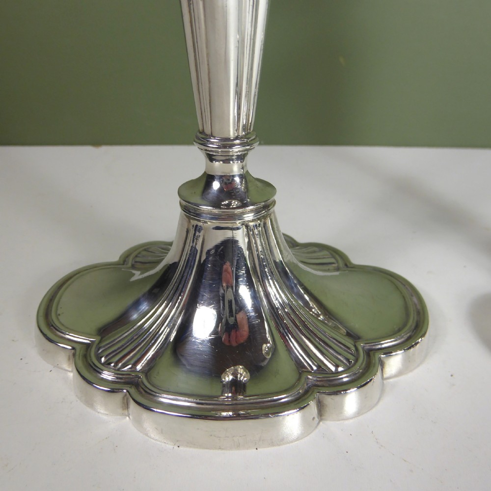 PAIR OF SILVER CANDLESTICKS View VI