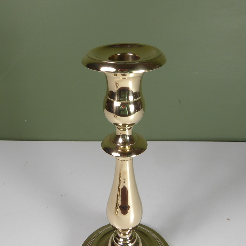 PAIR OF 19TH C BELL METAL CANDLESTICKS View II