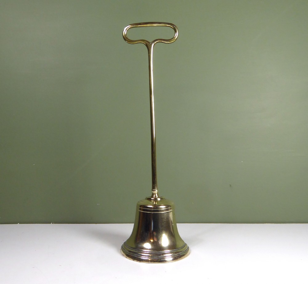EARLY 19TH C BRASS DOOR STOP, DOOR PORTER