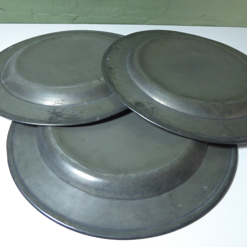 SET OF THREE 18TH C PEWTER CHARGERS View II