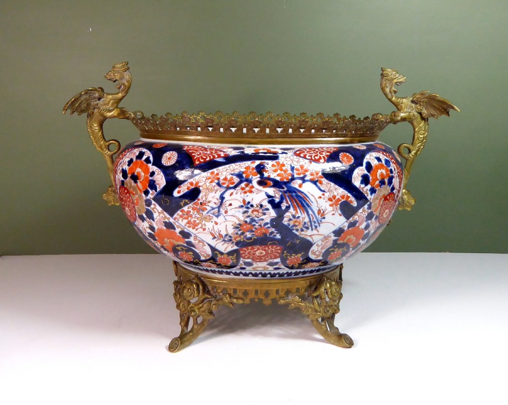 LARGE 19TH C IMARI BOWL WITH GILT MOUNTS
