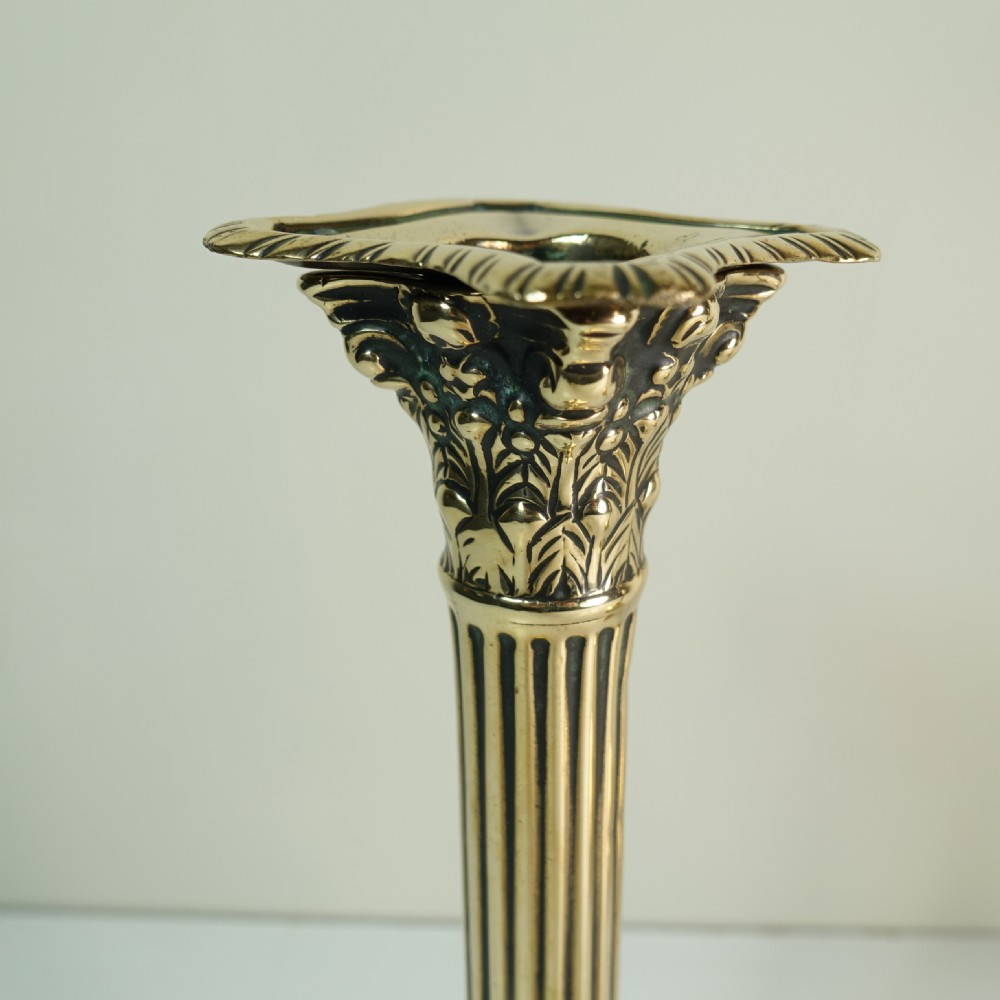 PAIR OF GEORGE III BRASS CANDLESTICKS View III