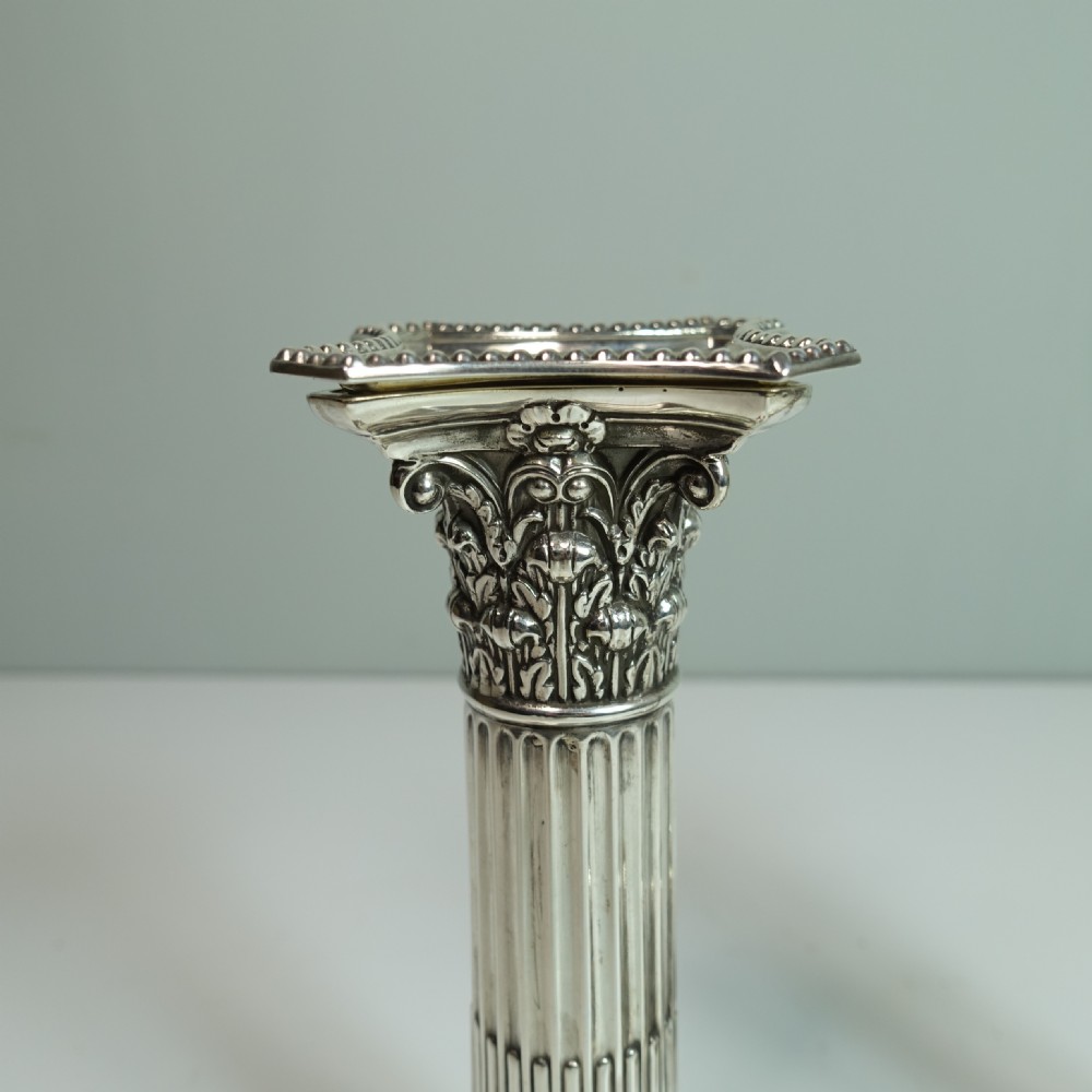 PAIR OF 19TH C SILVER CANDLESTICKS View II