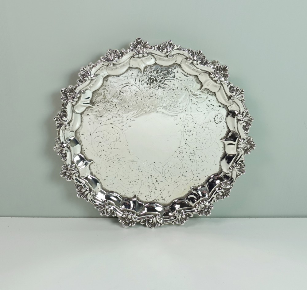 A 19TH C SOLID SILVER ENGRAVED SALVER
