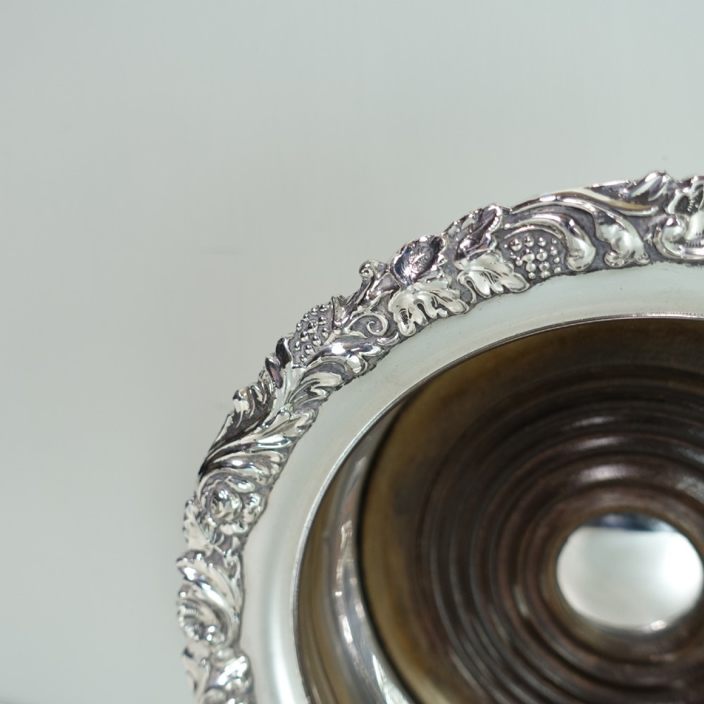 PAIR OF 19TH C SILVER PLATED BOTTLE COASTERS View IV
