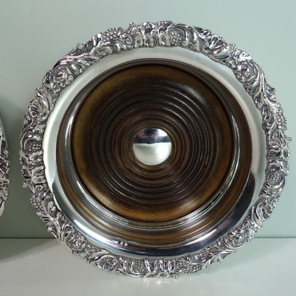 PAIR OF 19TH C SILVER PLATED BOTTLE COASTERS View V