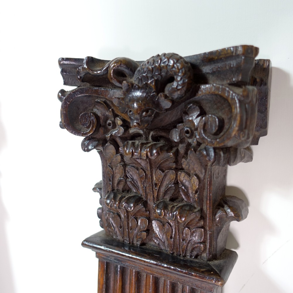 PAIR OF 17TH C CARVED OAK PILASTERS View II