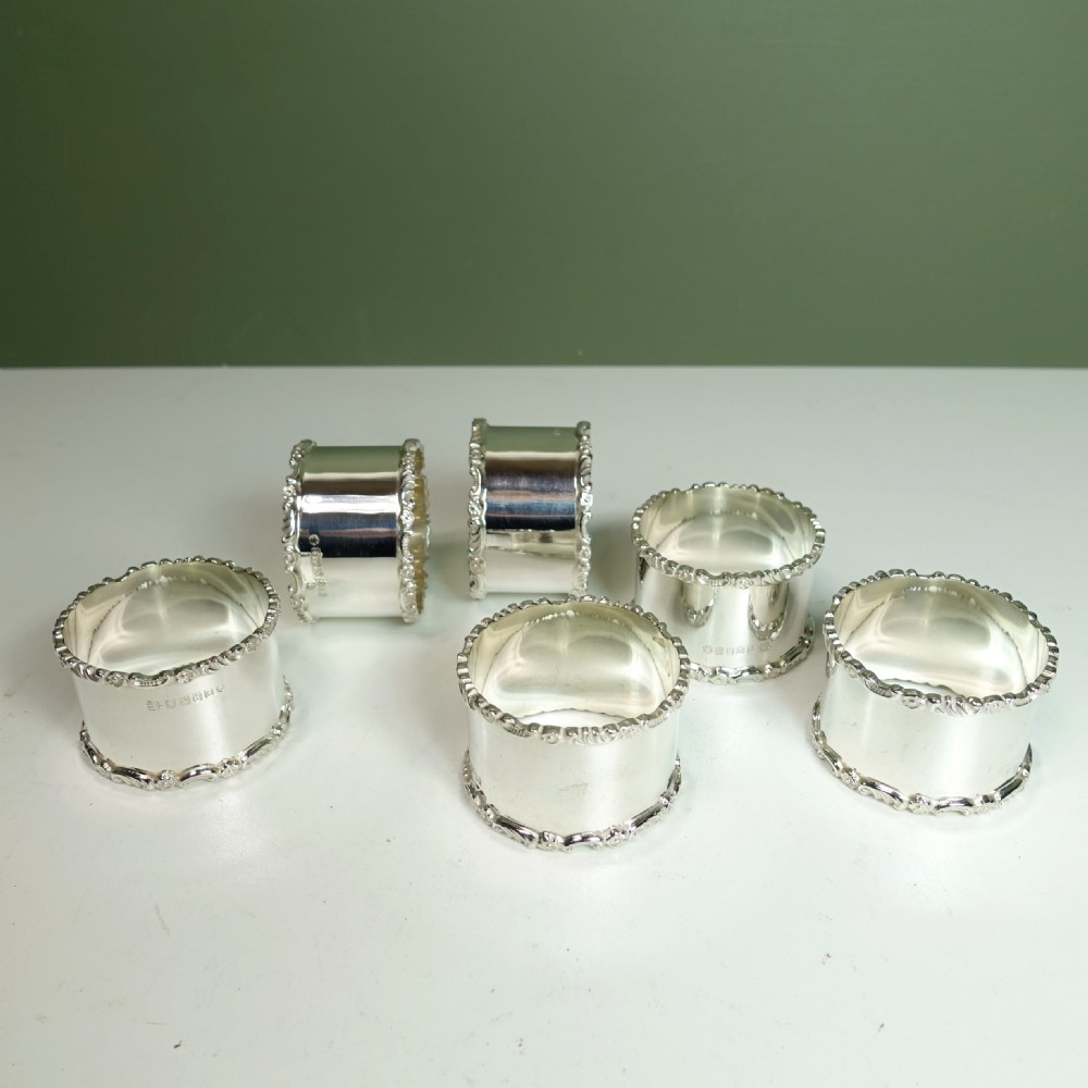 SET OF 19TH C SILVER PLATED NAPKIN RINGS View III