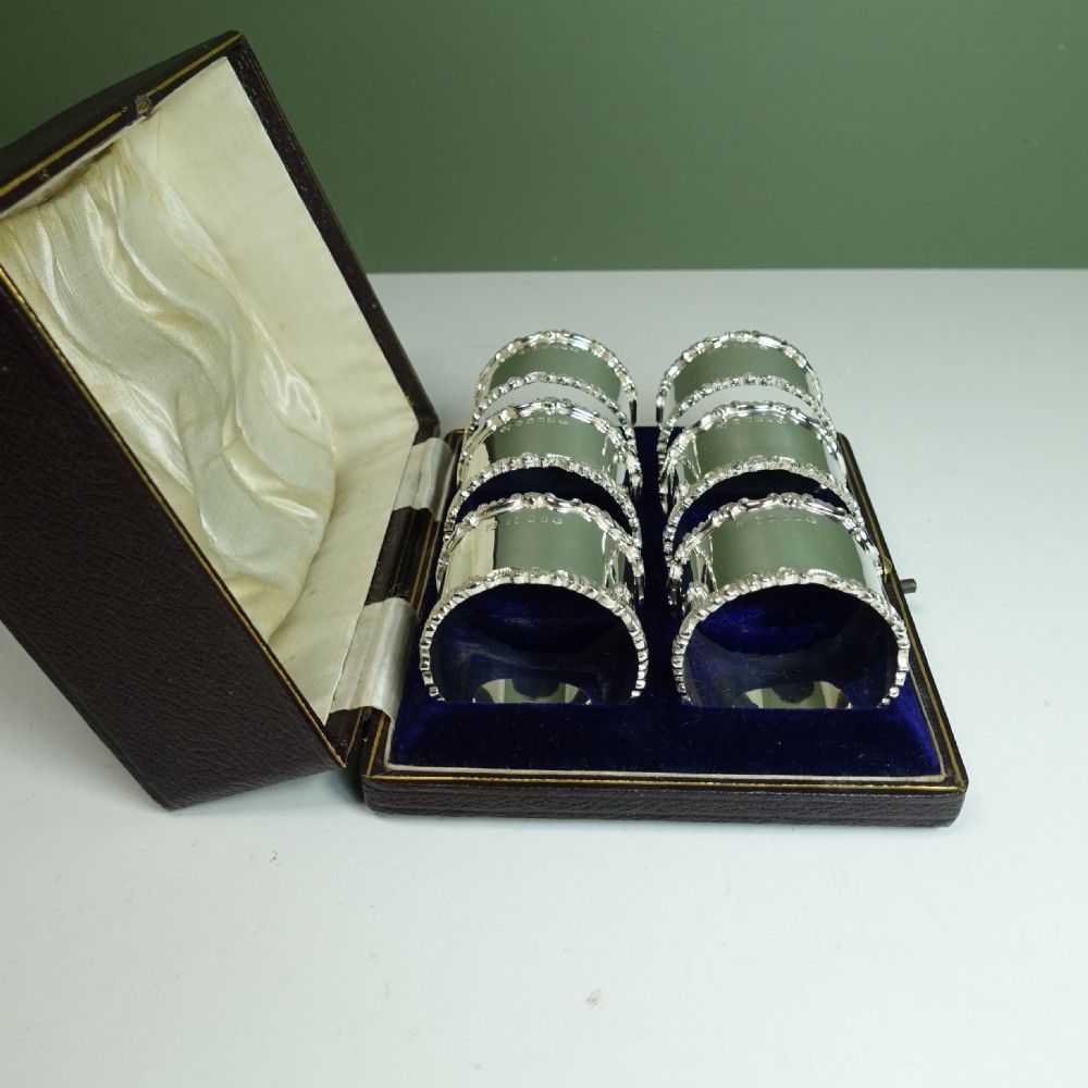 SET OF 19TH C SILVER PLATED NAPKIN RINGS View VI