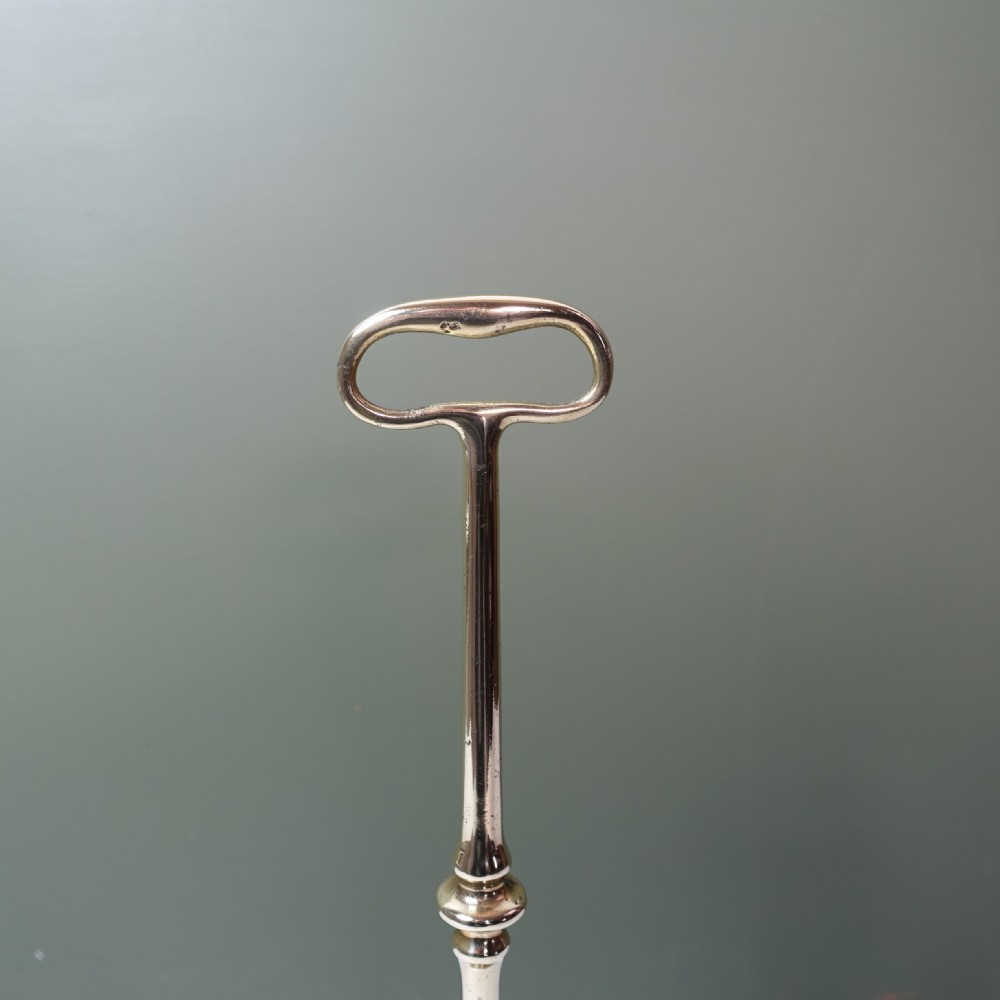 19TH C BRASS DOOR STOP View V