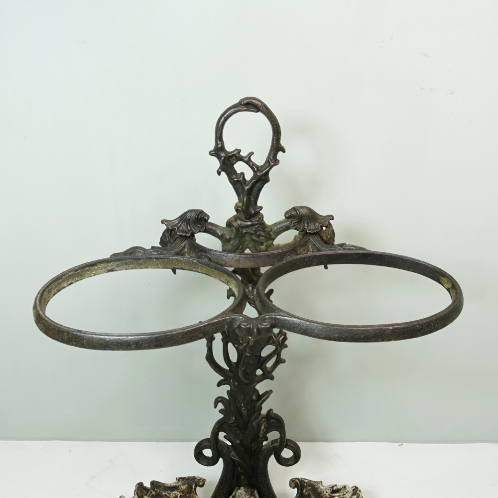 19TH C DOLPHIN CAST IRON STICK STAND View III