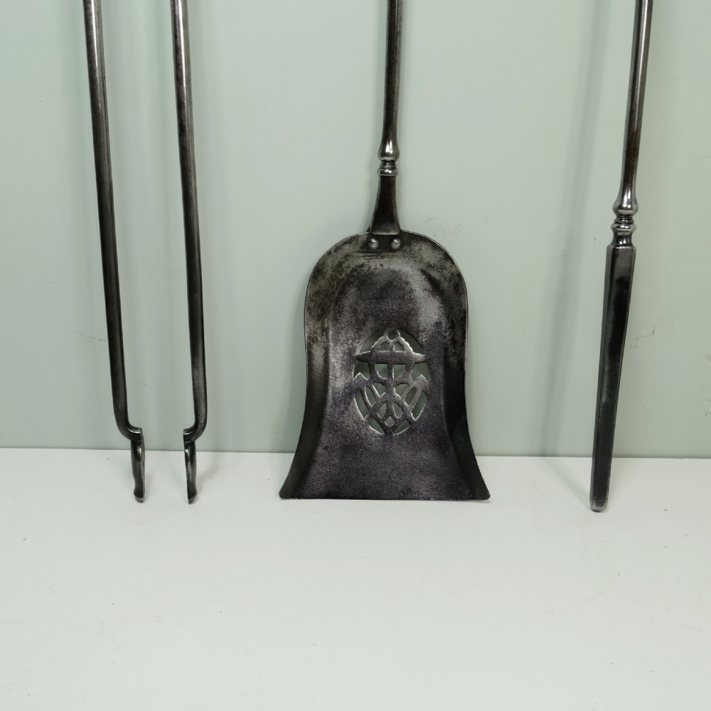 SET OF GEORGE III BURNISHED STEEL FIRE TOOLS View II