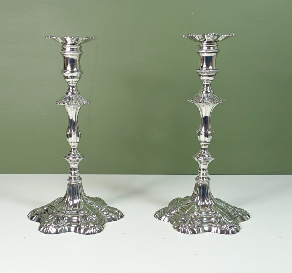 PAIR OF 18TH C CAST SILVER CANDLESTICKS