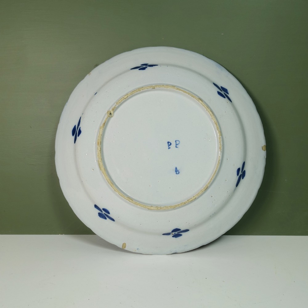 18TH C EXUBERANTLY DECORATED DELFT CHARGER View V