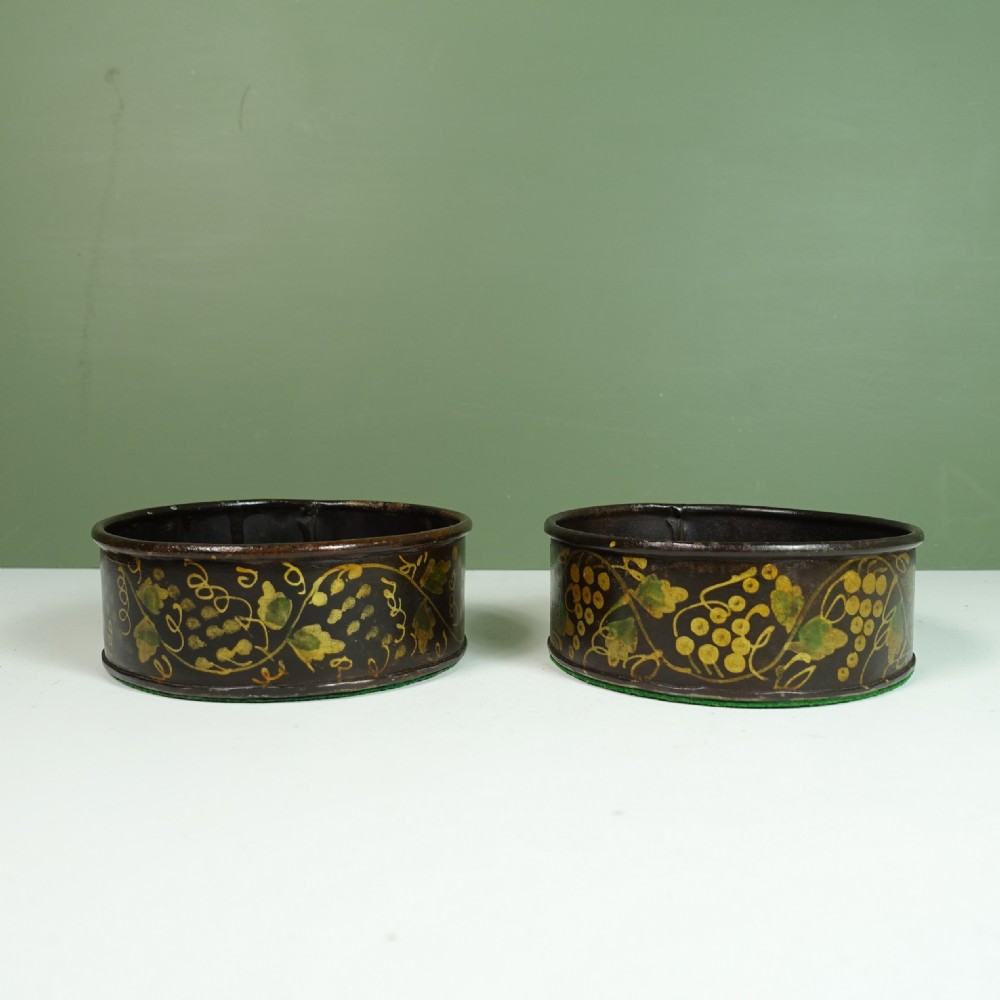PAIR OF 19TH C TOLE WINE BOTTLE COASTERS View II