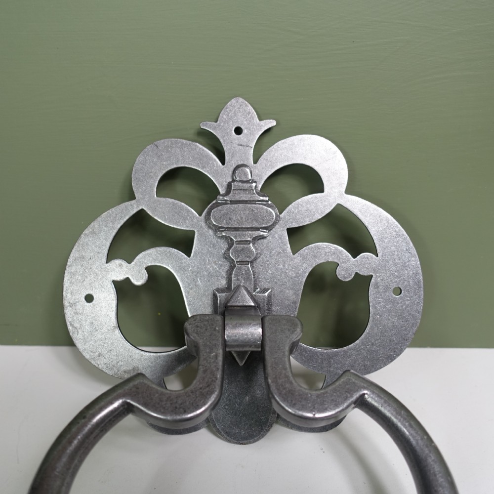 18TH C BURNISHED STEEL DOOR KNOCKER View V