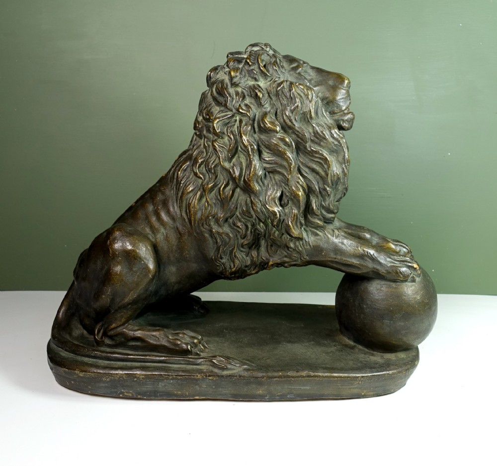 LARGE TERRACOTTA FIGURE OF A LION