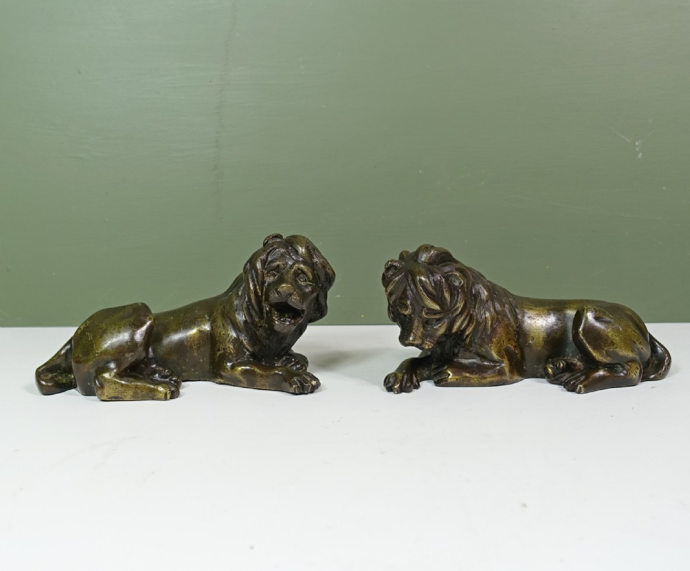 PAIR OF EARLY 19TH C BRONZE LIONS