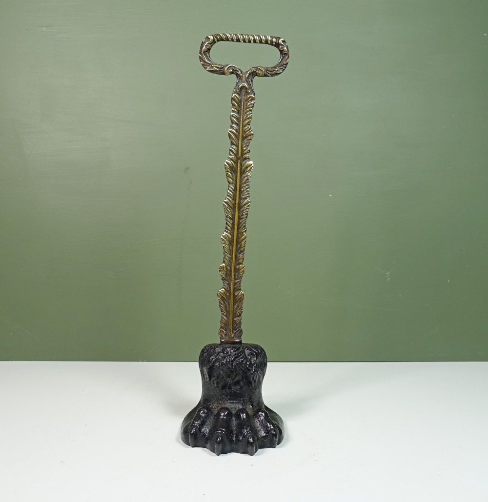 19TH C LIONS PAW DOOR PORTER