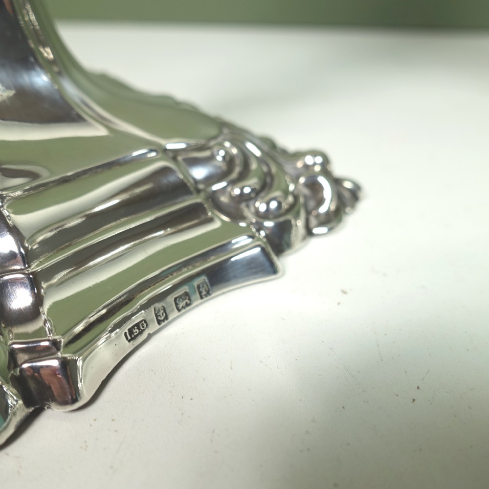 PAIR OF SILVER CANDLESTICKS View V